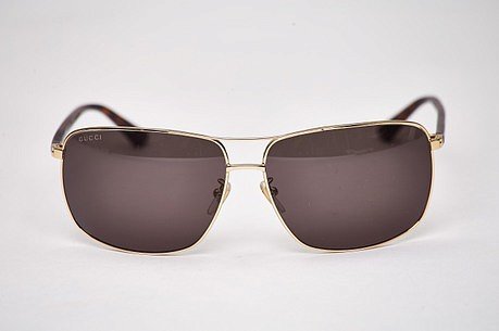 Солнцезащитные очки Gucci GG0065SK 004